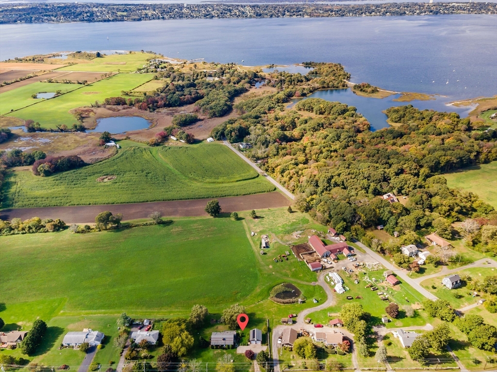 3211 Main Road Tiverton, RI 02878 - Photo 4 of 34 view of a lake with an outdoor space
