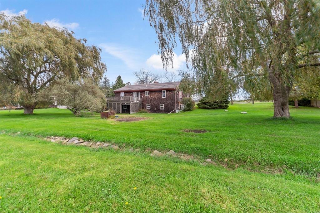 3211 Main Road Tiverton, RI 02878 - Photo 9 of 34 a view of a house with a big yard