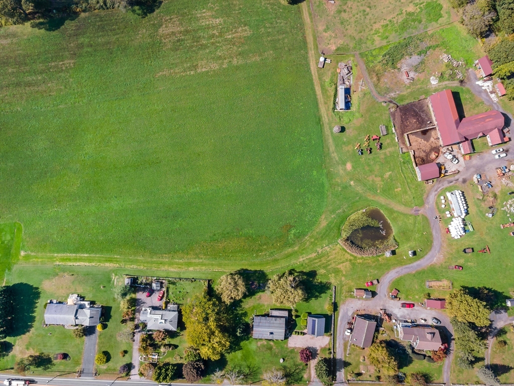 3211 Main Road Tiverton, RI 02878 - Photo 10 of 34 an aerial view of a house with a garden