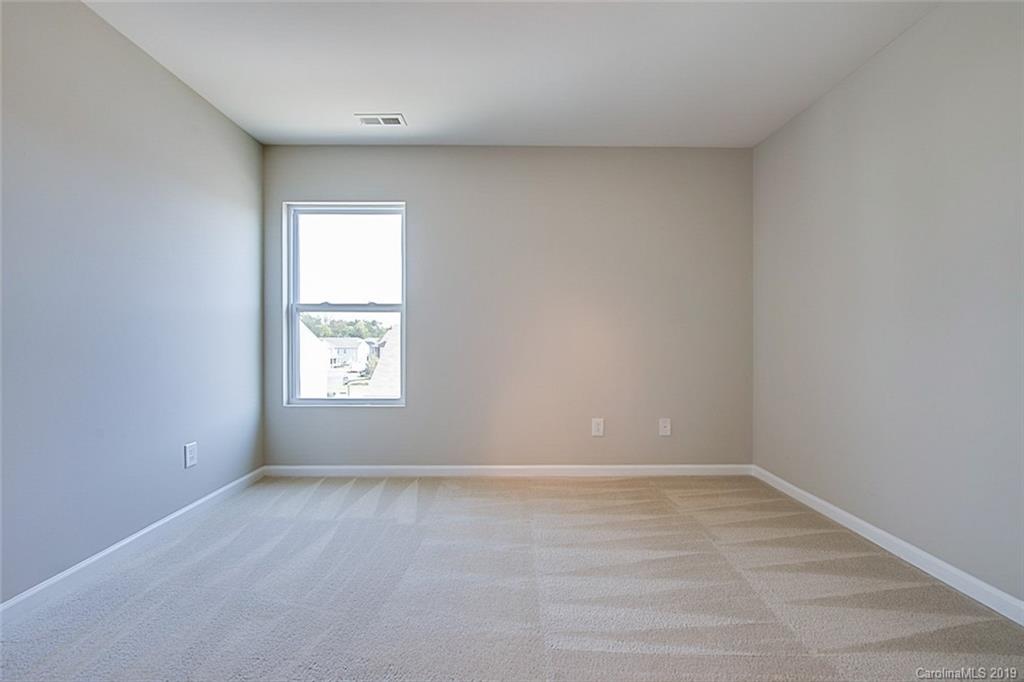 1022 Yellow Bee Road Indian Trail, NC 28079 - Photo 15 of 20 an empty room with a window