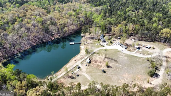 a view of a lake with a yard