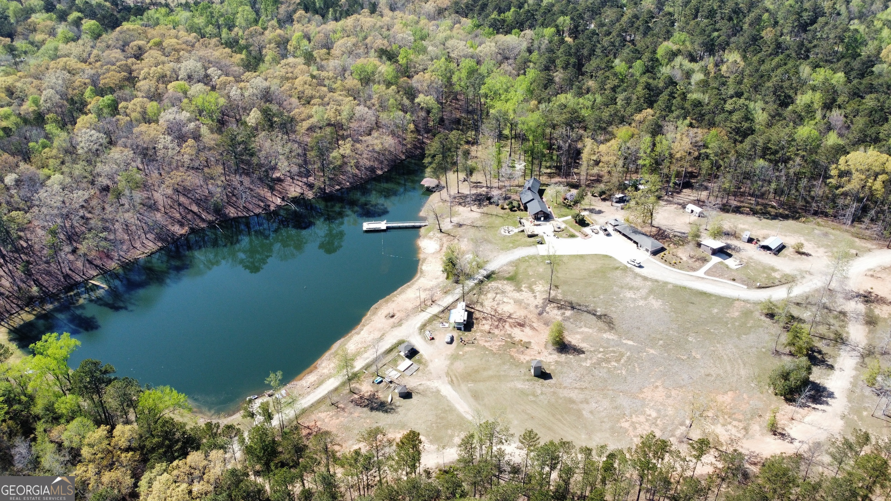 a view of a lake with a yard