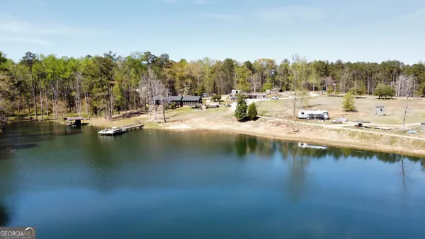 a view of a lake with trees