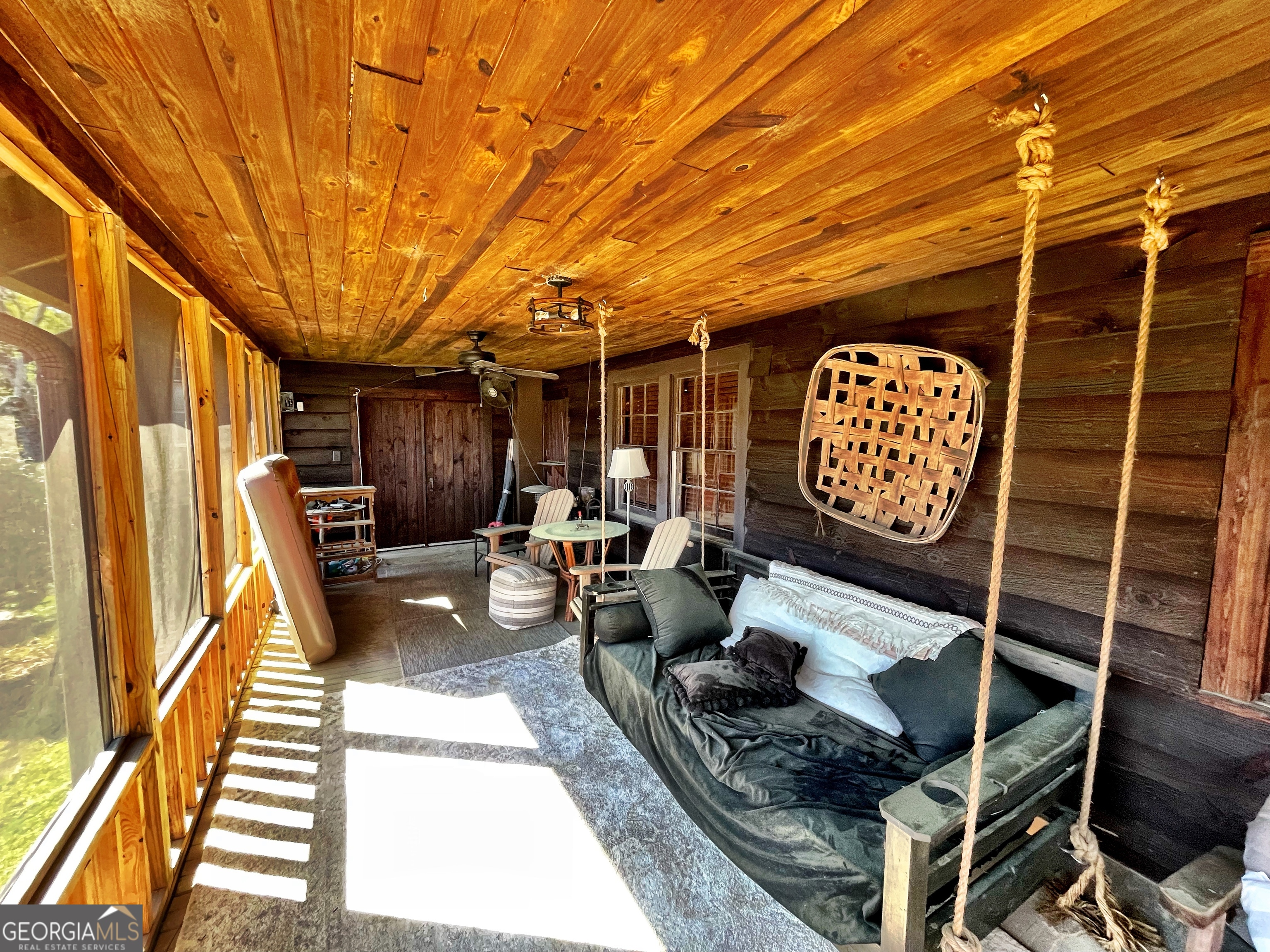 6591 Thomaston Road Macon, GA 31220 - Photo 7 of 30 a view of barbecue area with wooden walls