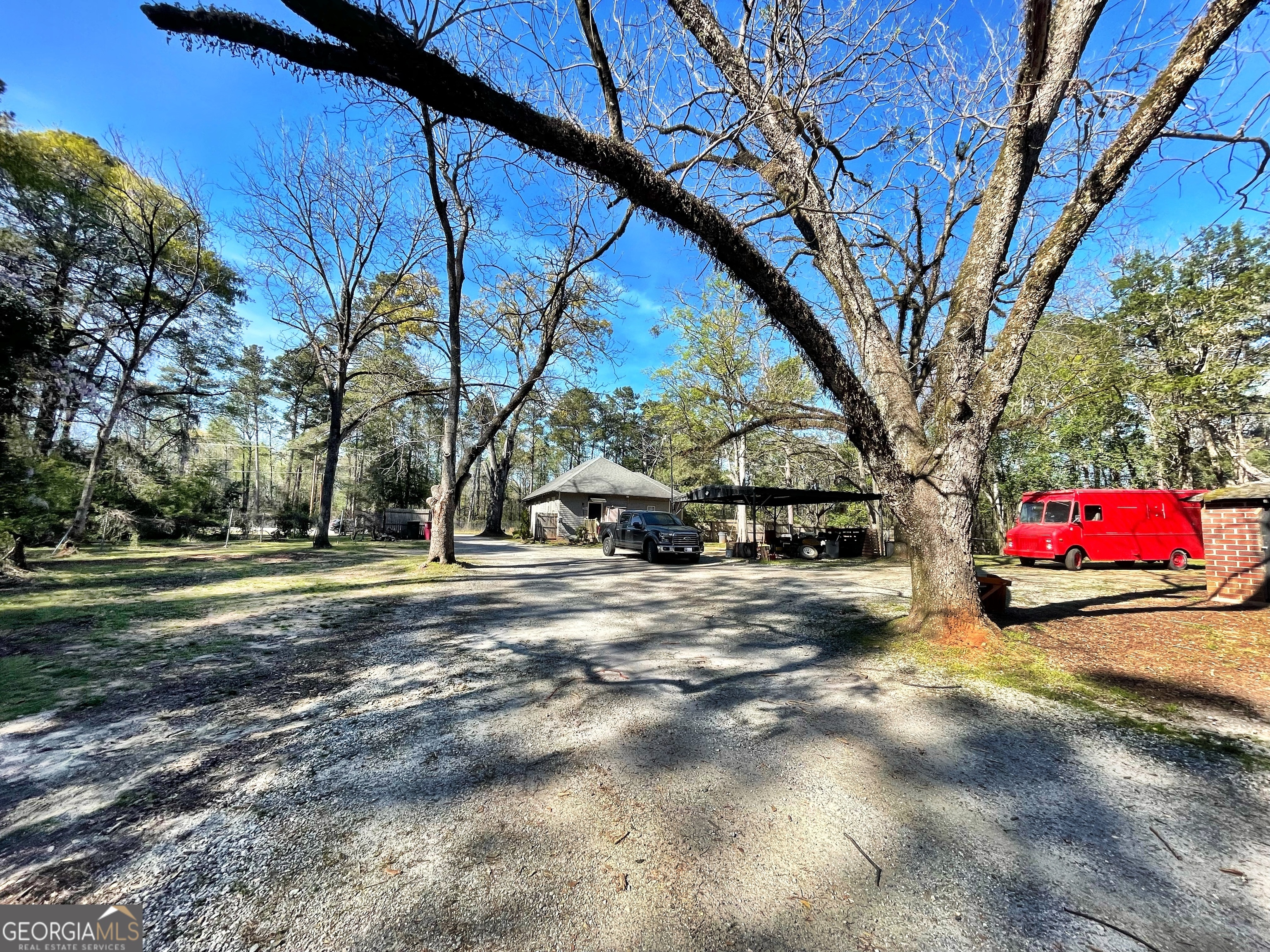 6591 Thomaston Road Macon, GA 31220 - Photo 10 of 30 a view of road with trees