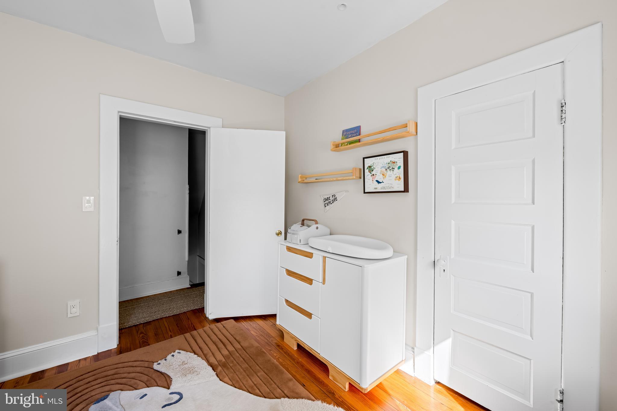 5009 Catalpha Road Baltimore, MD 21214 - Photo 23 of 38 a bedroom with a bed and a window