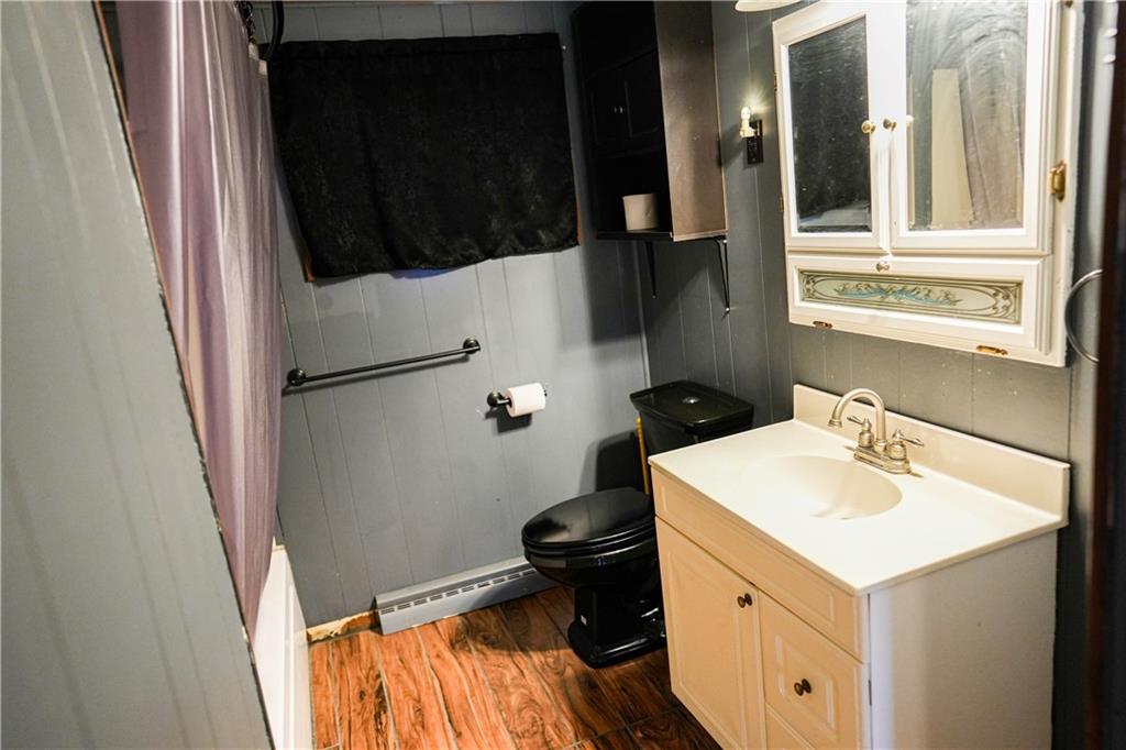1390 Garretts Run Road Ford City, PA 16226 - Photo 12 of 24 a bathroom with a sink and a mirror