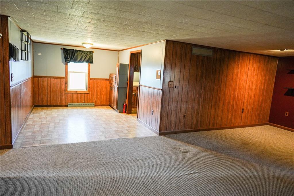 1390 Garretts Run Road Ford City, PA 16226 - Photo 4 of 24 a view of an empty room with wooden floor