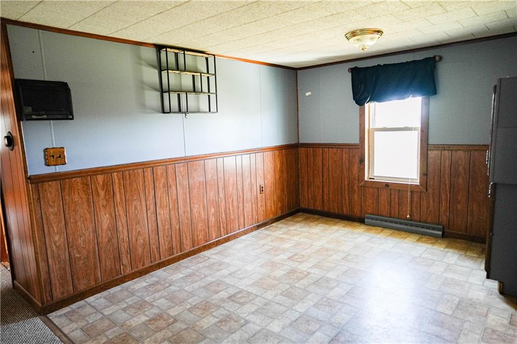 1390 Garretts Run Road Ford City, PA 16226 - Photo 5 of 24 a view of a livingroom with wooden floor and a window