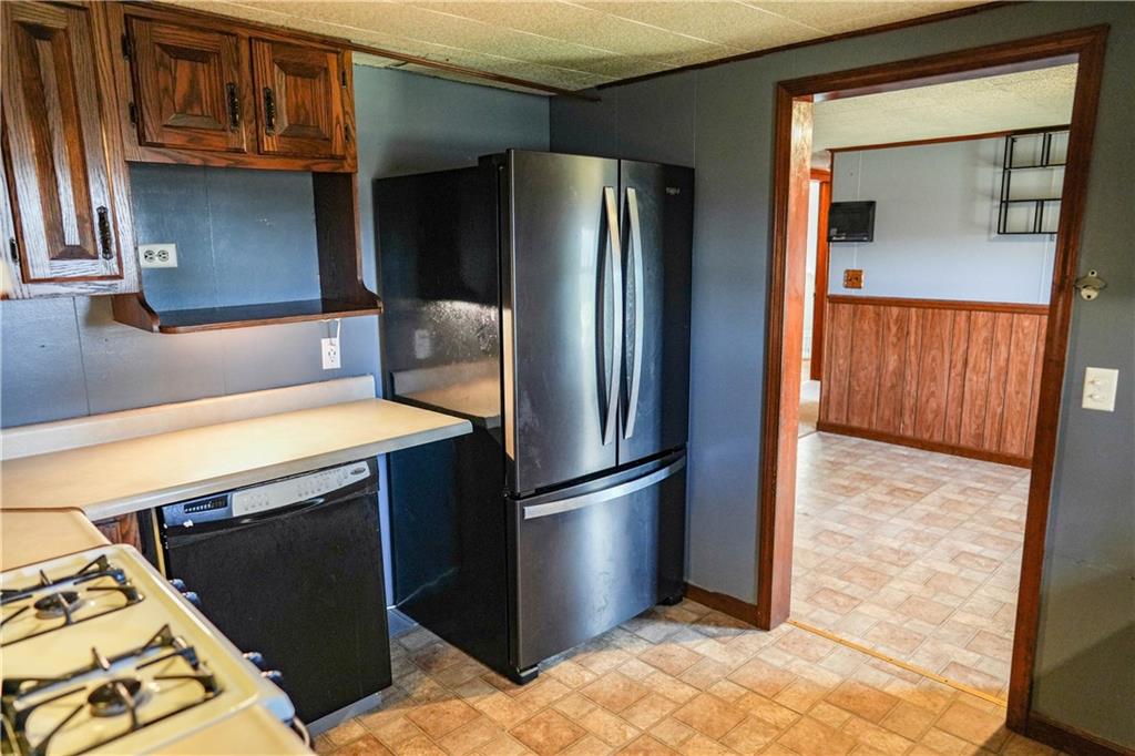 1390 Garretts Run Road Ford City, PA 16226 - Photo 7 of 24 a metallic refrigerator freezer sitting in a kitchen