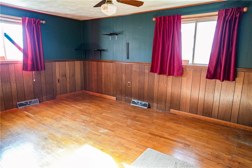 1390 Garretts Run Road Ford City, PA 16226 - Photo 9 of 24 a view of a bedroom with a bed and a window