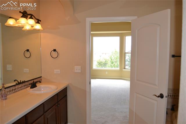 2353 Cinnabar Road Colorado Springs, CO 80921 - Photo 33 of 48 Master bath looking out towards bedroom