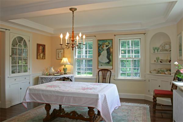 153 Packard Hill Road Ashburnham, MA 01430 - Photo 6 of 30 a bedroom with a bed window and chandelier