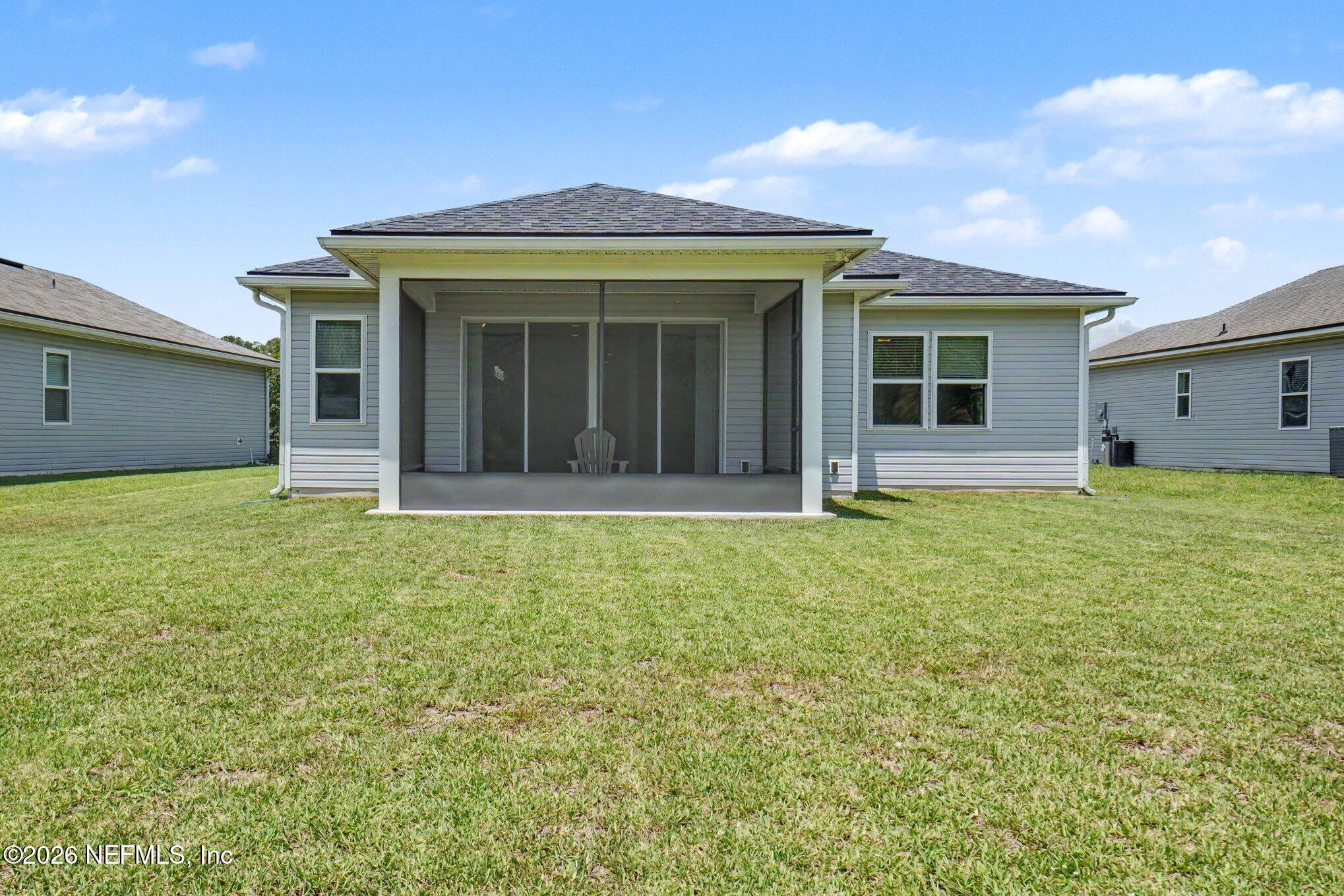 4630 Pine Ridge Parkway Middleburg, FL 32068 - Photo 28 of 35 front view of a house with yard