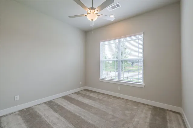 an empty room with a bathroom