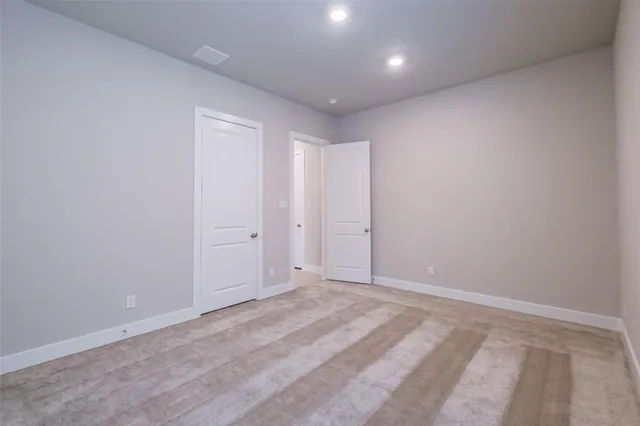 an empty room with a bench