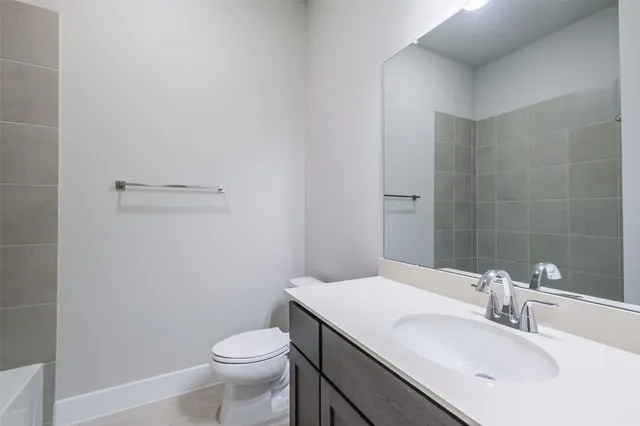 a view of a backyard with brick wall