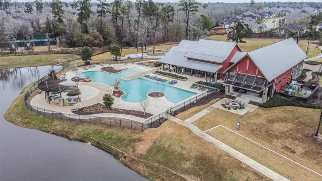 a view of a swimming pool with a lounge chairs