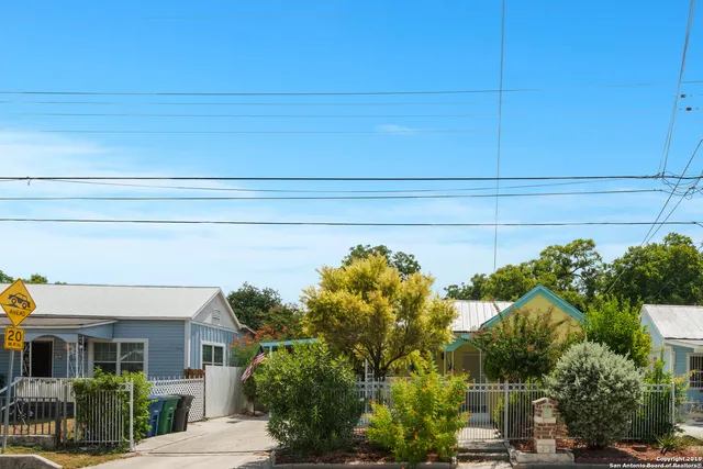 a backyard of a house with trees