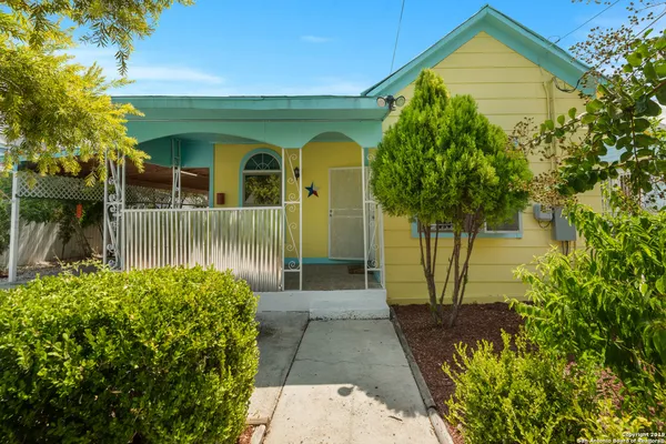 a front view of a house with a porch