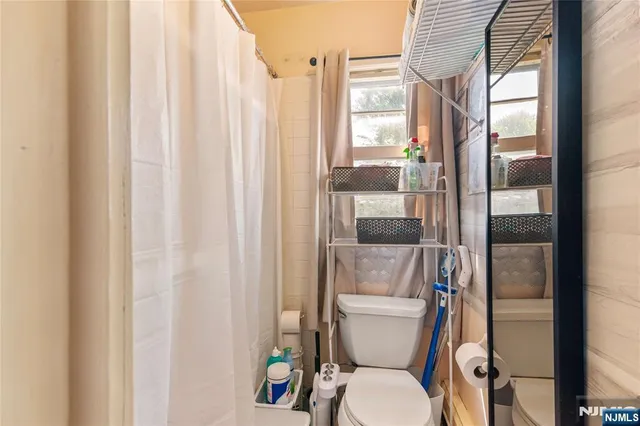 a view of a house with a yard balcony