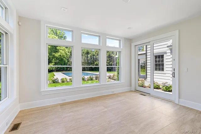 a view of cabinets and window