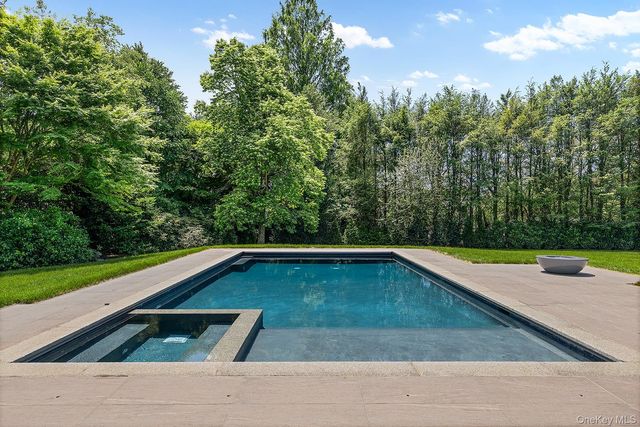 a view of a patio with a fireplace