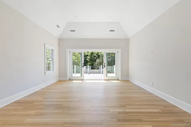 a view of a park with large trees