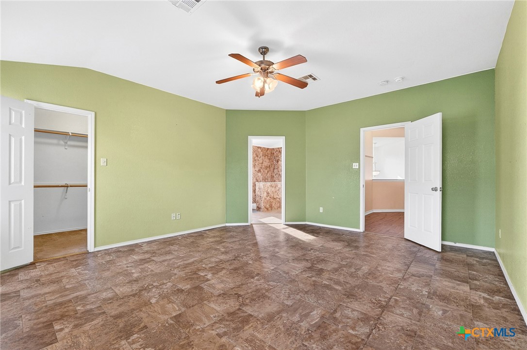 6204 Taree Loop Killeen, TX 76549 - Photo 16 of 24 a view of a big room with closet and windows