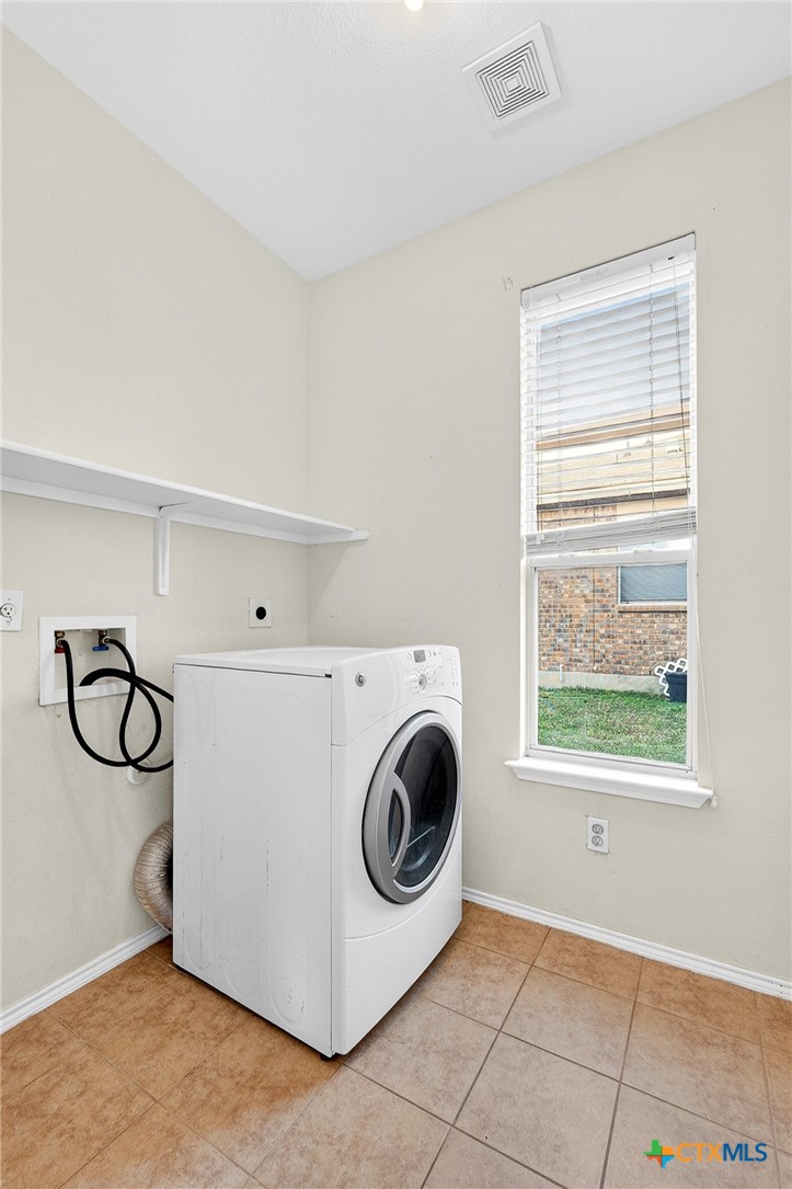 6204 Taree Loop Killeen, TX 76549 - Photo 21 of 24 a utility room with dryer and washer