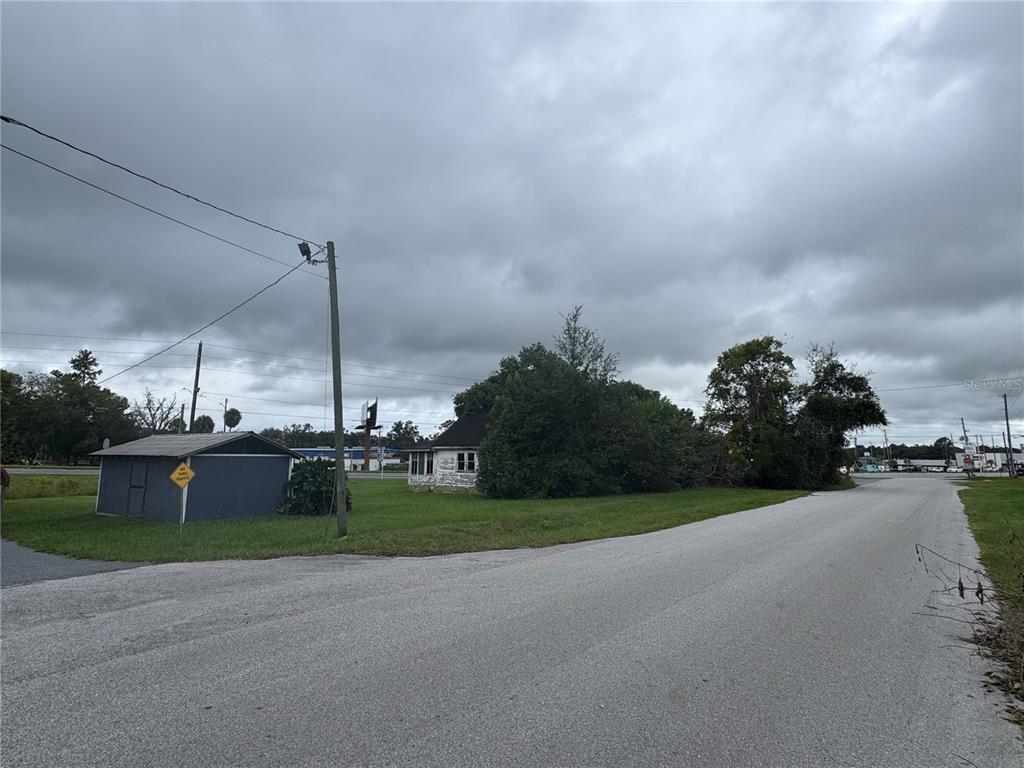 6222 Southeast 113th Street Belleview, FL 34420 - Photo 6 of 6 a green field with lots of tress in it