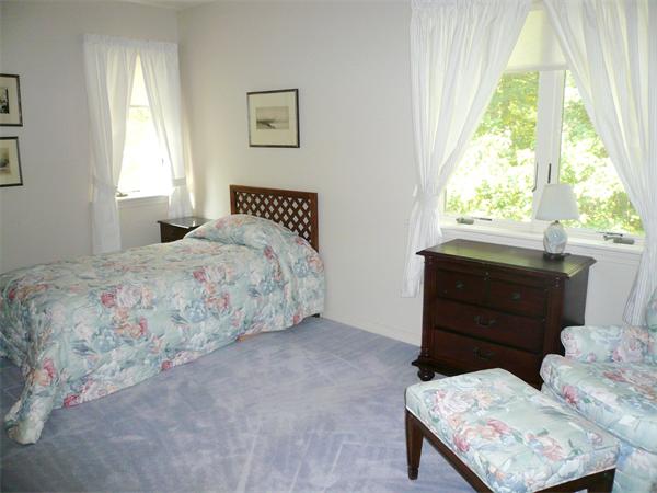 223 Green Road Bolton, MA 01740 - Photo 15 of 21 a bedroom with a bed and a window