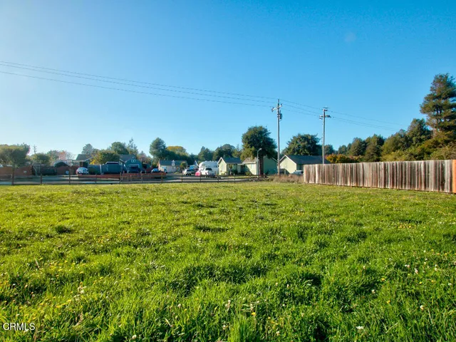 a view of a garden and basketball court