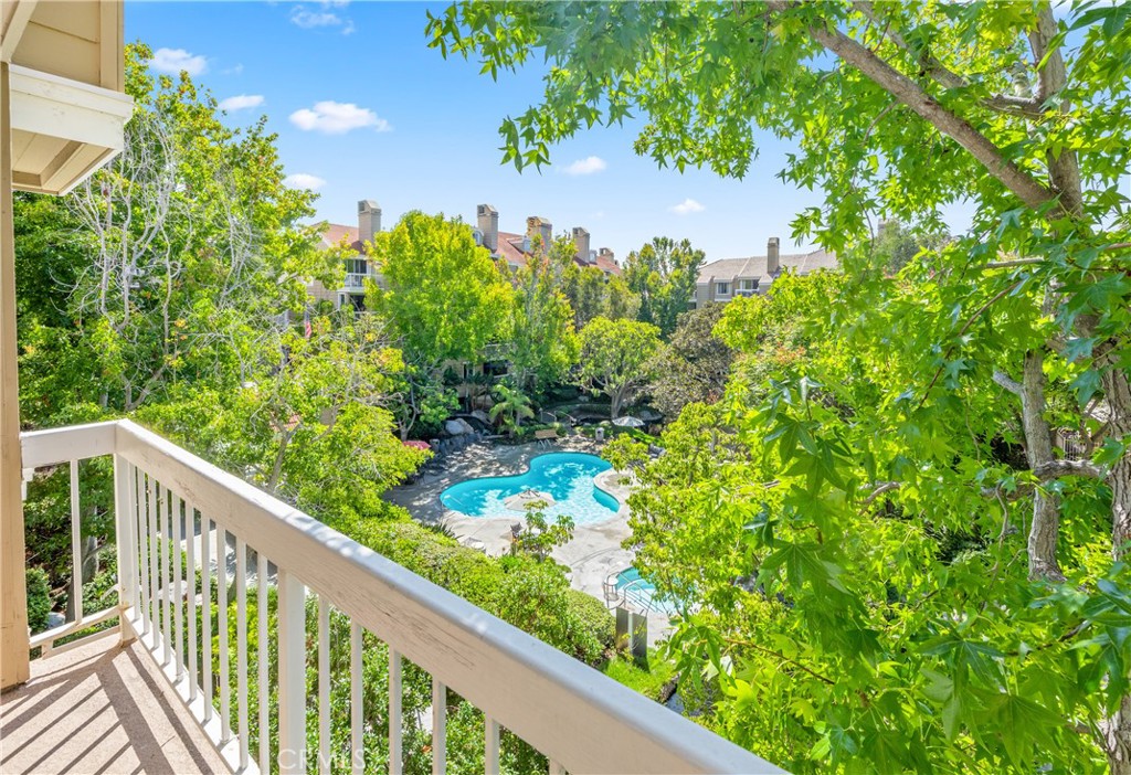 a view of a garden from a balcony