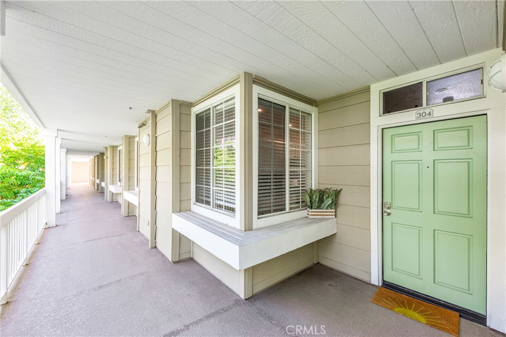 20301 Bluffside Circle, Unit 304 Huntington Beach, CA 92646 - Photo 2 of 36 a view of a room with a large window