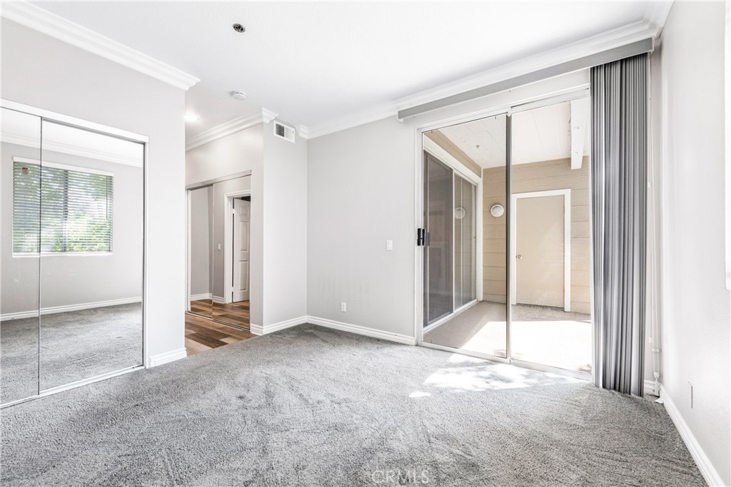 20301 Bluffside Circle, Unit 304 Huntington Beach, CA 92646 - Photo 29 of 36 a view of entryway with wooden floor