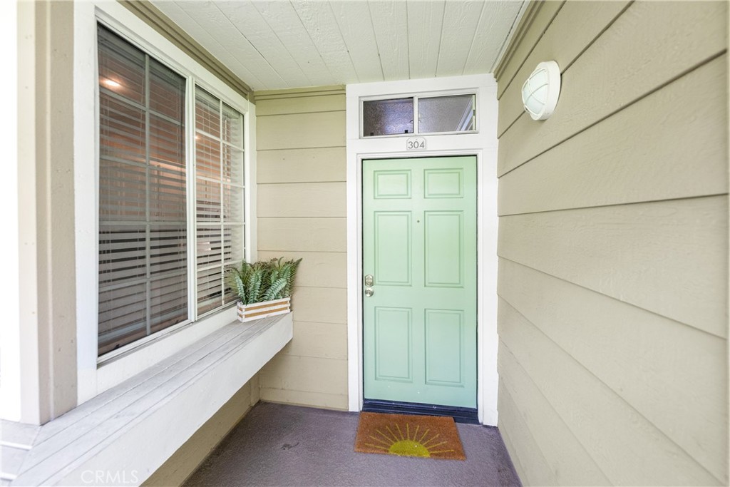 20301 Bluffside Circle, Unit 304 Huntington Beach, CA 92646 - Photo 3 of 36 a view of livingroom with furniture
