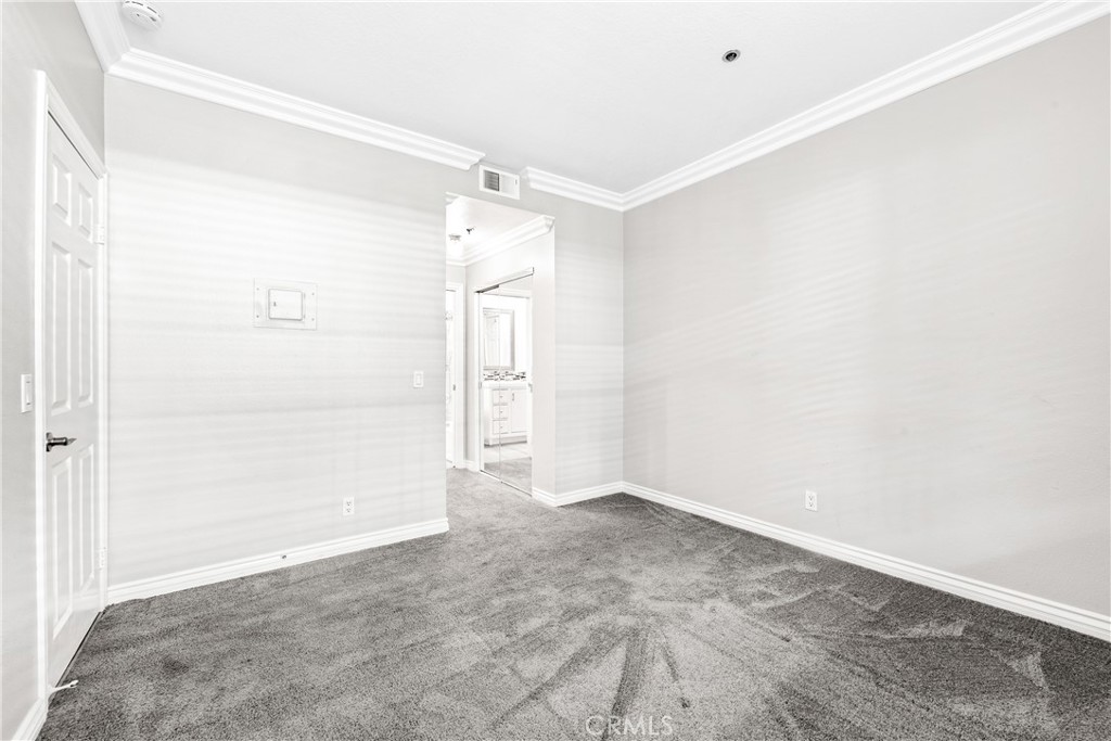 20301 Bluffside Circle, Unit 304 Huntington Beach, CA 92646 - Photo 7 of 36 a view of an empty room