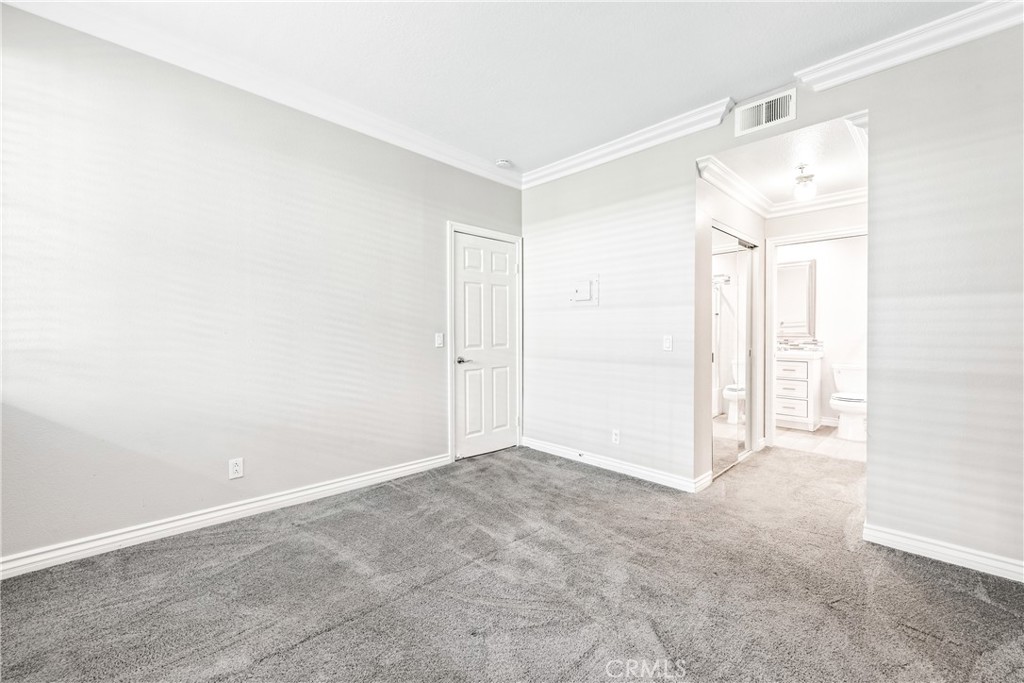 20301 Bluffside Circle, Unit 304 Huntington Beach, CA 92646 - Photo 8 of 36 a view of an empty room