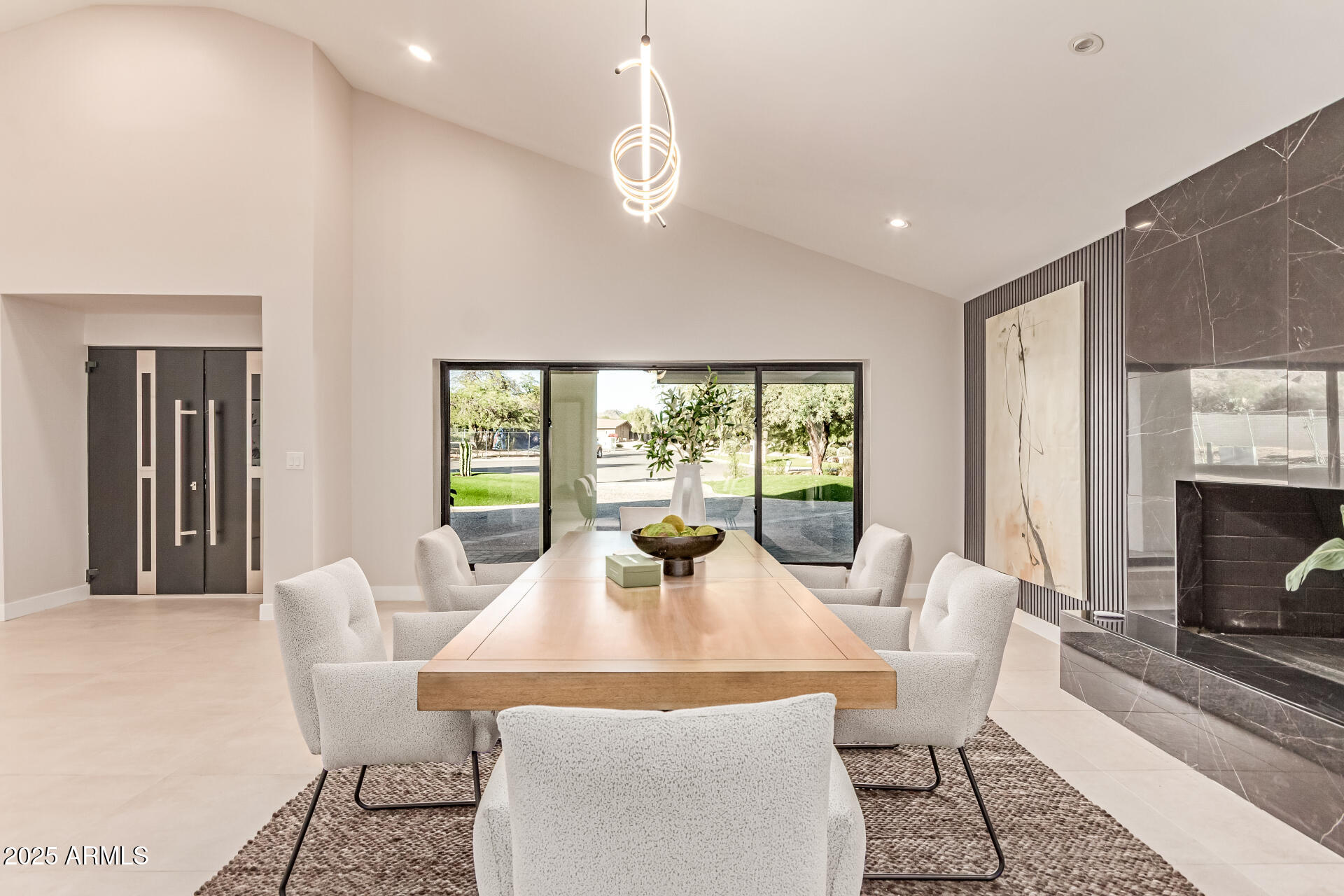 3301 East Rovey Avenue Paradise Valley, AZ 85253 - Photo 7 of 105 a view of a dining room with furniture window and outside view