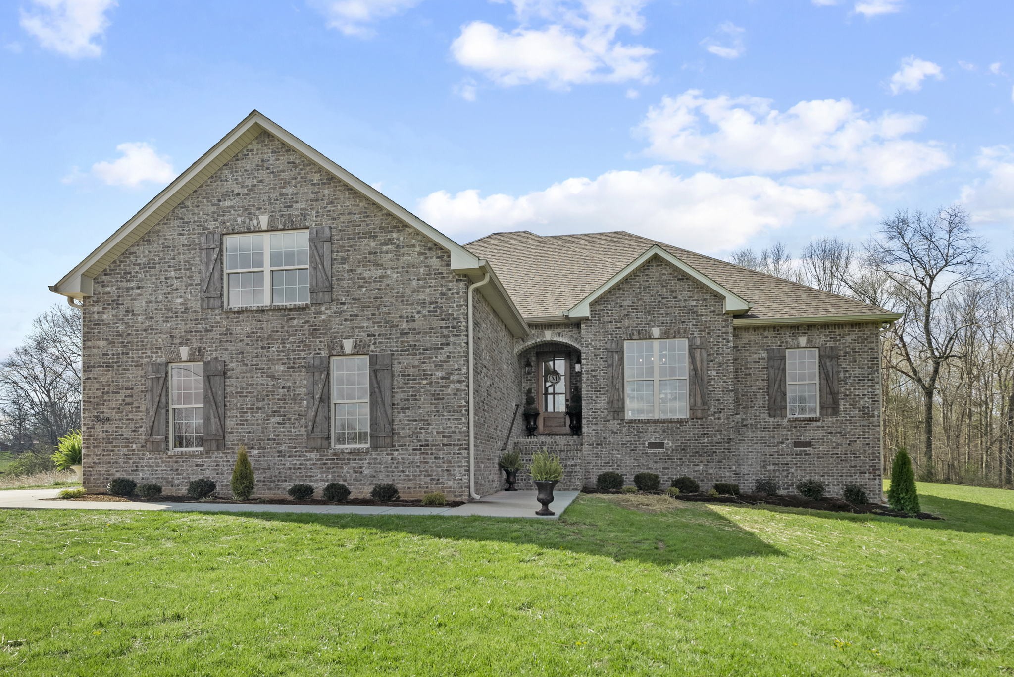3459 Thompson Road Springfield, TN 37172 - Photo 1 of 39 a front view of a house with a garden