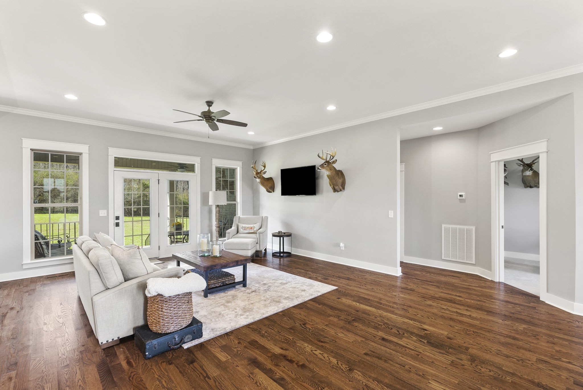 3459 Thompson Road Springfield, TN 37172 - Photo 12 of 39 a living room with furniture wooden floor and a flat screen tv