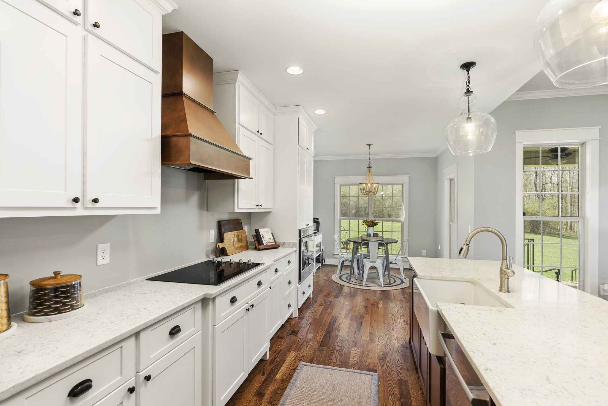 3459 Thompson Road Springfield, TN 37172 - Photo 17 of 39 a kitchen with sink cabinets and wooden floor