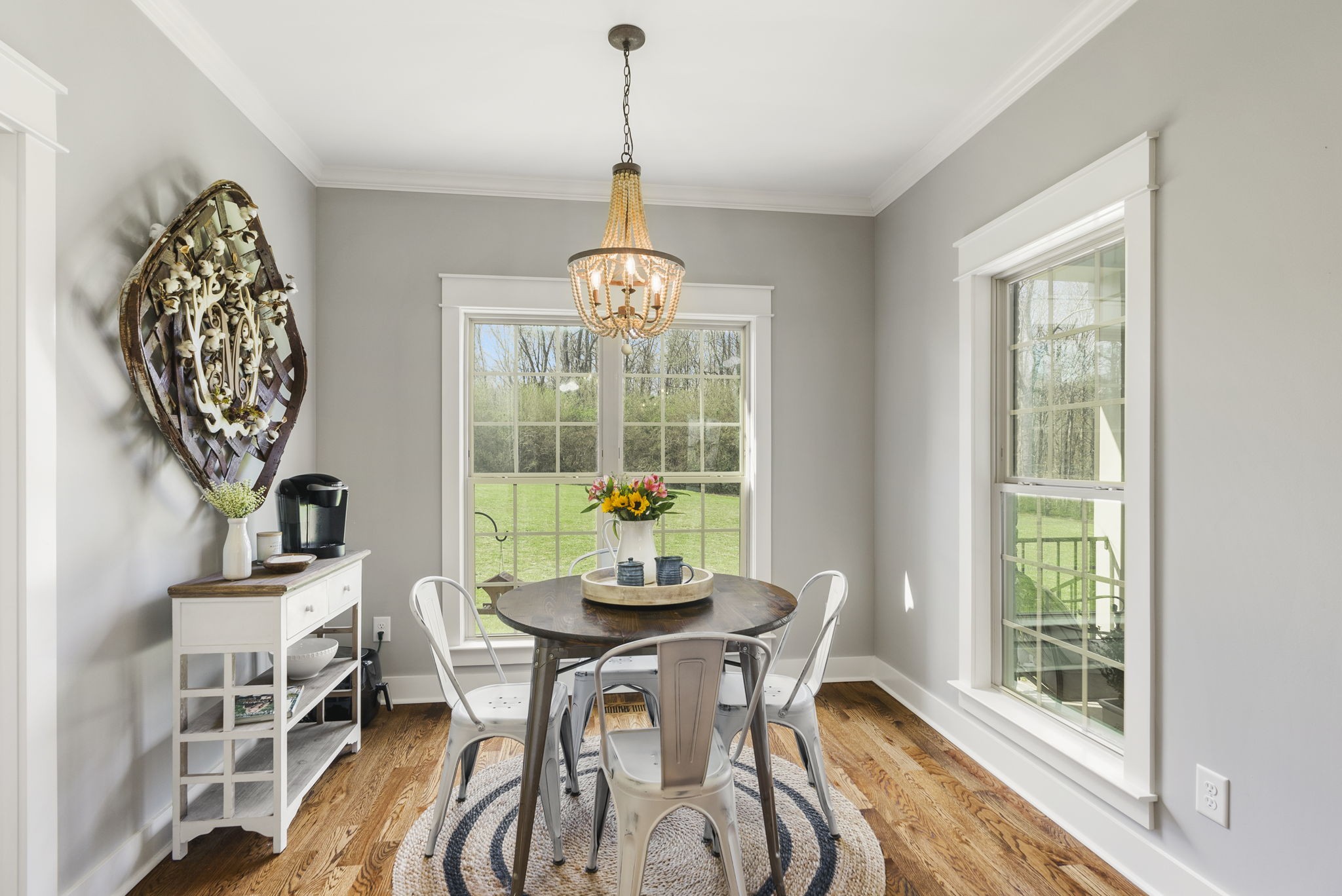 3459 Thompson Road Springfield, TN 37172 - Photo 18 of 39 a dining room with furniture a chandelier and wooden floor