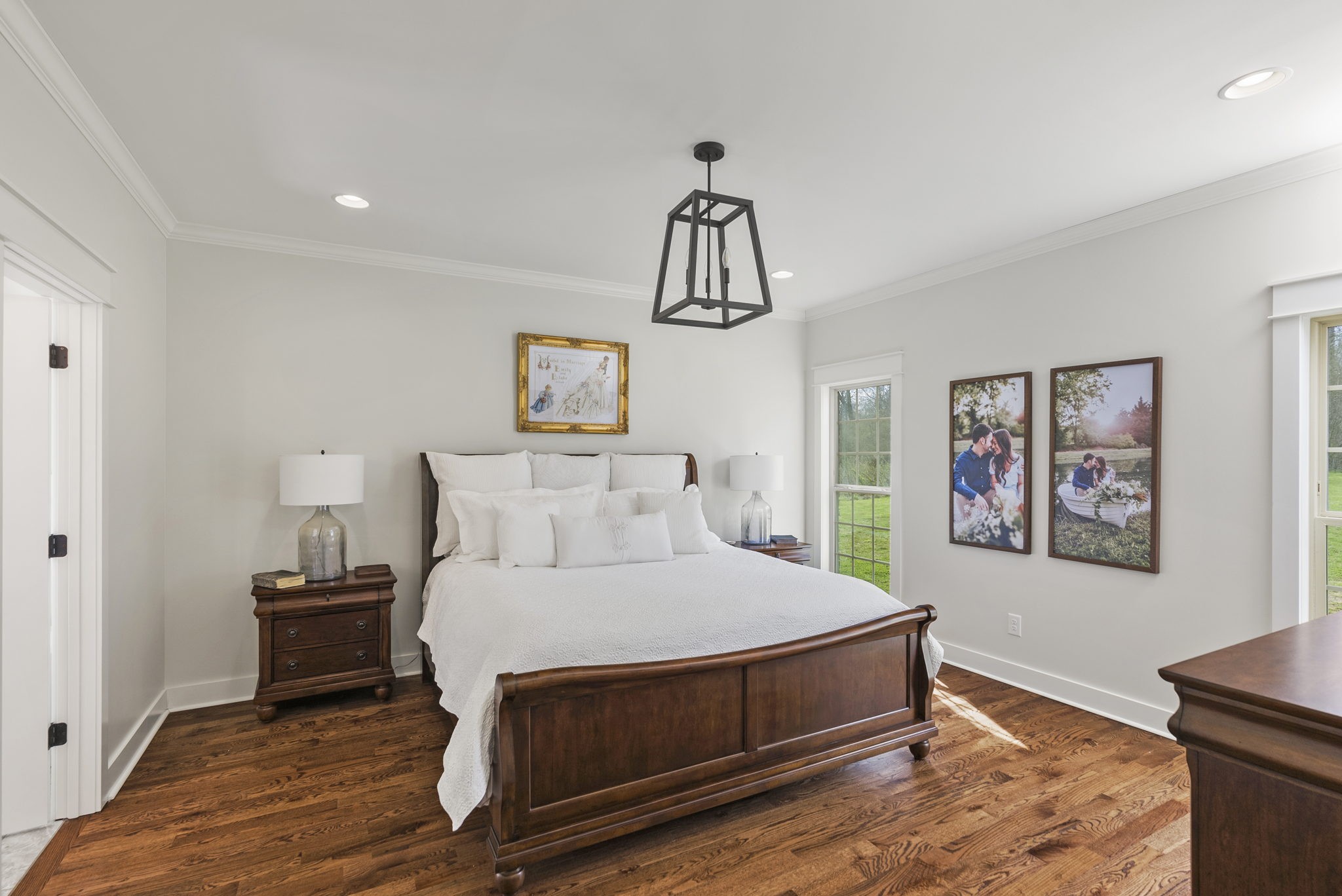 3459 Thompson Road Springfield, TN 37172 - Photo 19 of 39 a bedroom with a bed and a painting on the wall