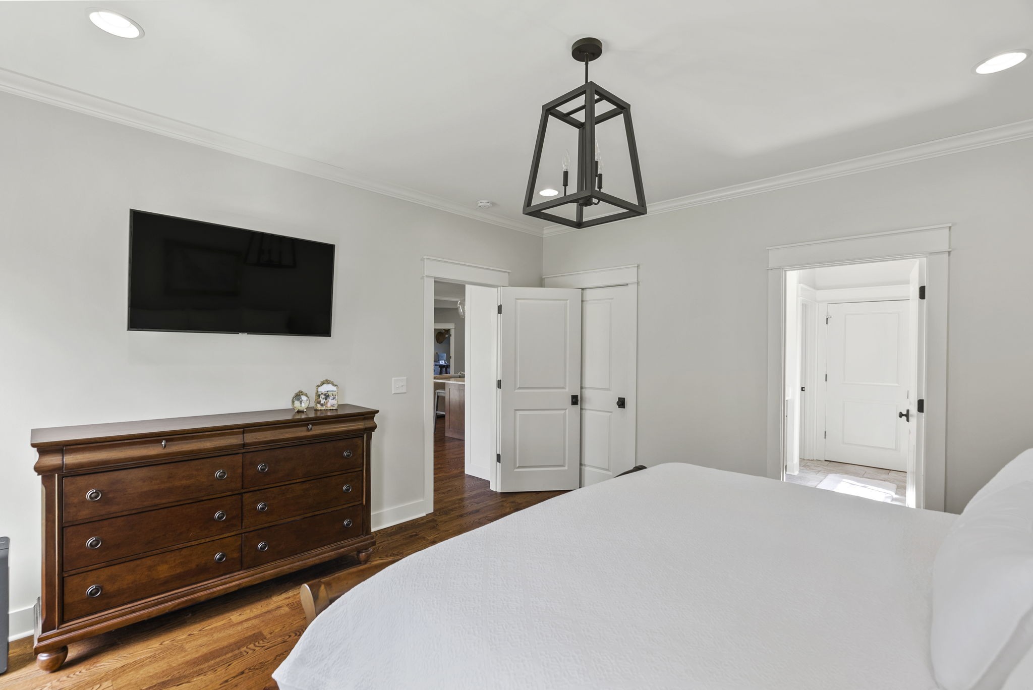 3459 Thompson Road Springfield, TN 37172 - Photo 20 of 39 a bedroom with a bed and a flat screen tv
