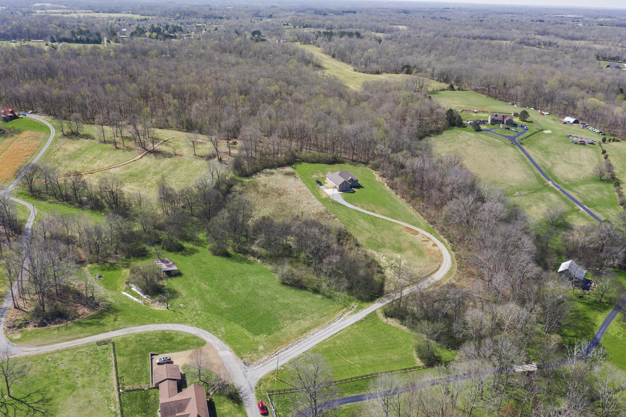3459 Thompson Road Springfield, TN 37172 - Photo 3 of 39 an aerial view of a house with a yard and lake
