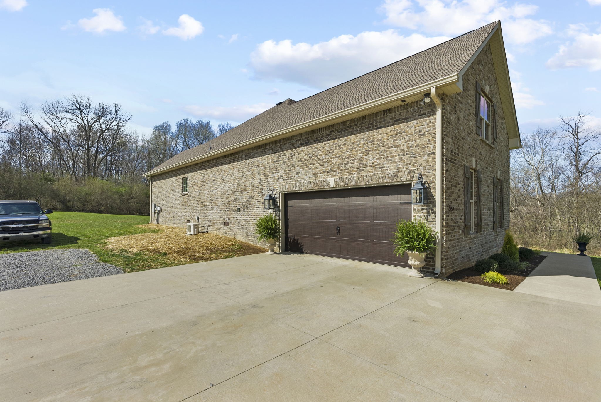 3459 Thompson Road Springfield, TN 37172 - Photo 34 of 39 a front view of a house with a yard and garage