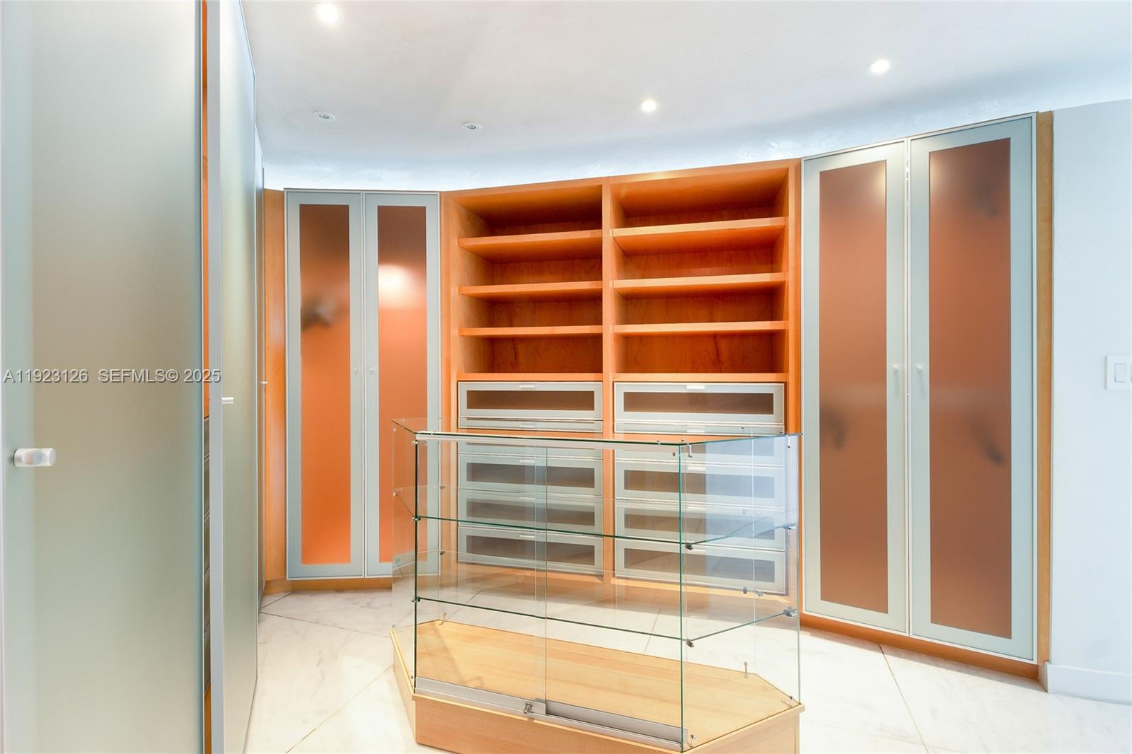 1643 Brickell Avenue, Unit 2902 Miami, FL 33129 - Photo 19 of 41 a view of walk in closet with empty racks