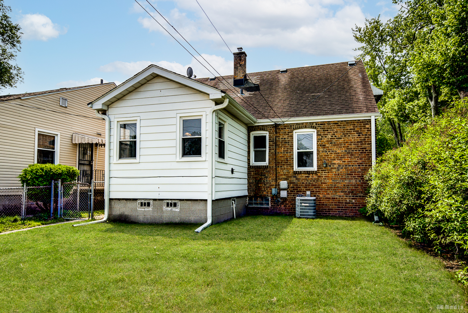 446 Warren Street Calumet City, IL 60409 - Photo 17 of 20 a view of a house with a yard